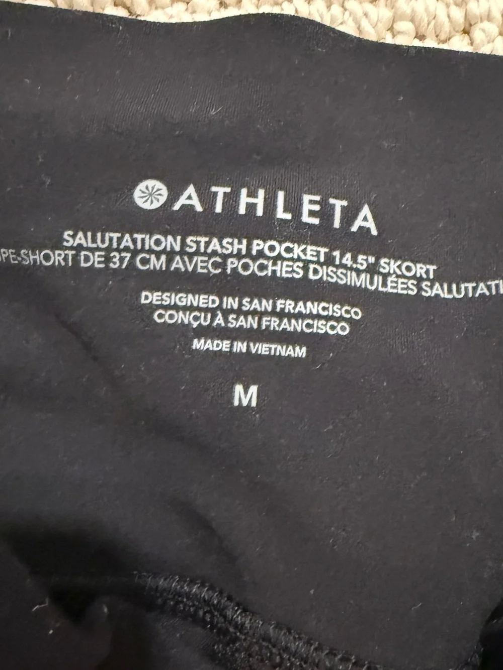 ATHLETA SALUTATION STASH HIGH RISE SKORT BLACK 14.5in SIZE MEDIUM